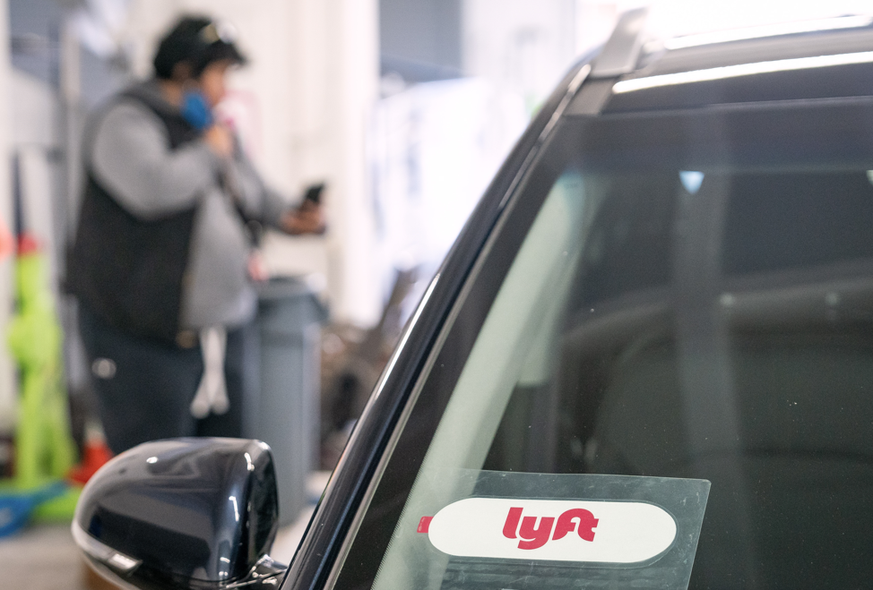 Lyft signage on a car at a vehicle 